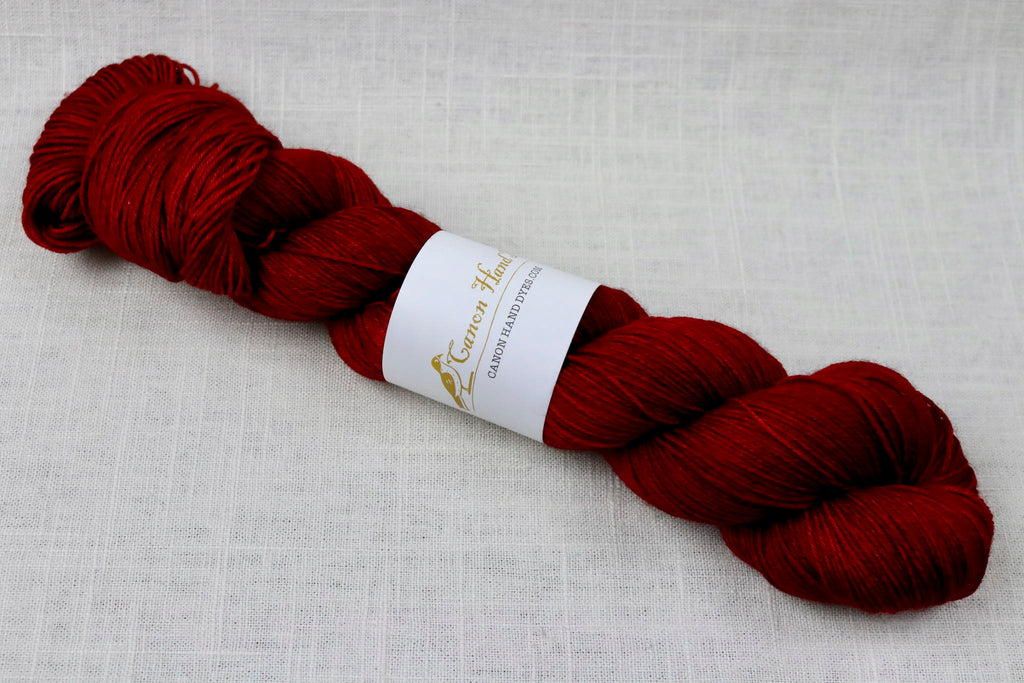 canon hand dyes john merino fingering duke of hastings, the most beautiful red, photos do not do it justice
